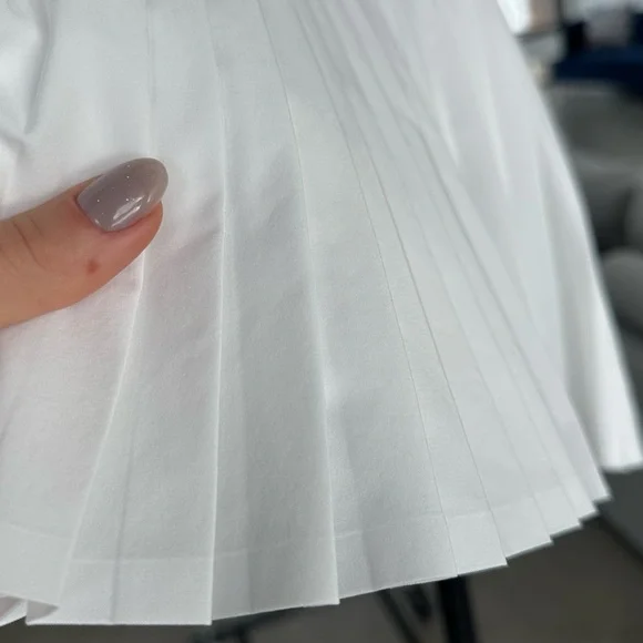 Chic White Pleated Mini Skirt - Picture 3 of 5